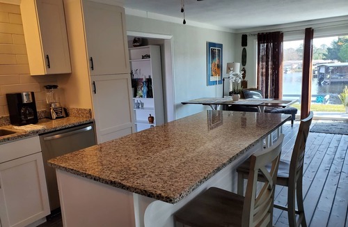 Tavares House | PETS STAY FREE Canal Front 3 bed/2 bath single family ample parking