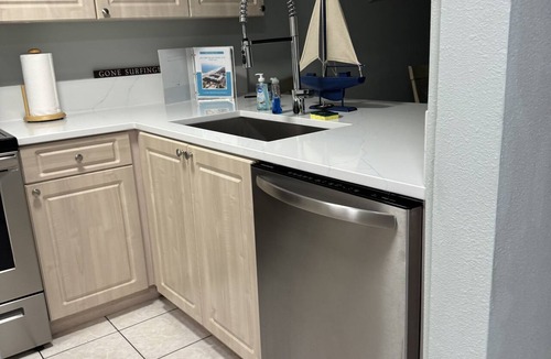 Point East Condo | Point East 107 Ground Floor Walk out To Pool No Drive Beach