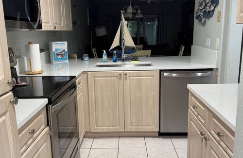 Point East Condo | Point East 107 Ground Floor Walk out To Pool No Drive Beach