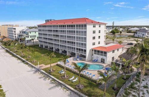 Mid Island Condo | Pointe South 403 | Stunning Views and Pool
