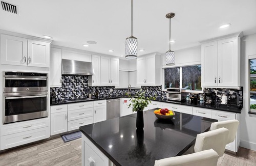Bel Air House | Pompano Beach Retreat Private Pool + Canal-Front Tiki Lounge | Coral Current