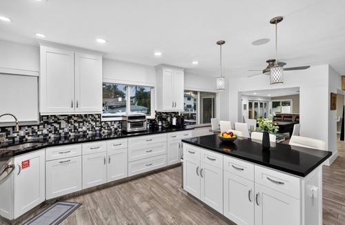 Bel Air House | Pompano Beach Retreat Private Pool + Canal-Front Tiki Lounge | Coral Current