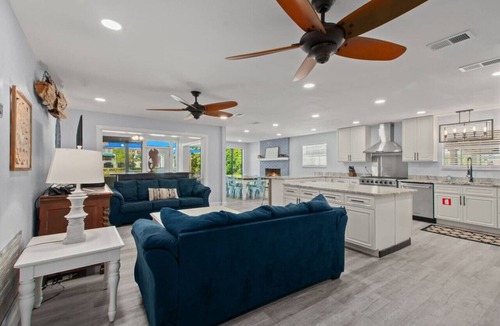 Thomas Drive House | Poseidon’s Palace ~ Waterfront Retreat with Heated Pool, Hot Tub & Private Dock