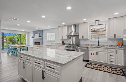 Thomas Drive House | Poseidon’s Palace ~ Waterfront Retreat with Heated Pool, Hot Tub & Private Dock