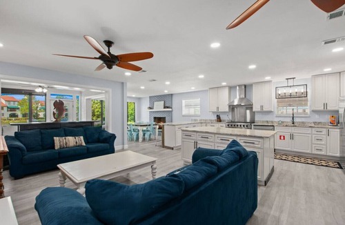 Thomas Drive House | Poseidon’s Palace ~ Waterfront Retreat with Heated Pool, Hot Tub & Private Dock
