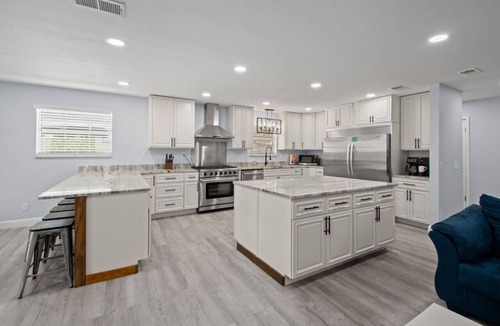 Thomas Drive House | Poseidon’s Palace ~ Waterfront Retreat with Heated Pool, Hot Tub & Private Dock