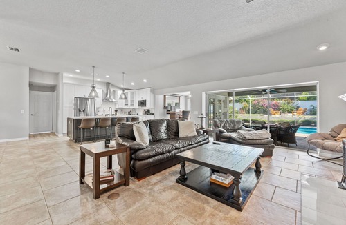 Palm Harbor House | Posh Palm Harbor Home w/Fireplace, Outdoor Firepit and Private Pool