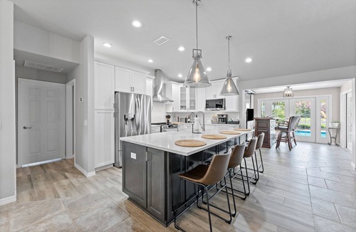 Palm Harbor House | Posh Palm Harbor Home w/Fireplace, Outdoor Firepit and Private Pool