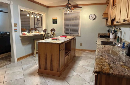 North Northwest Pensacola House | Private Oasis with Pool & Tiki Bar