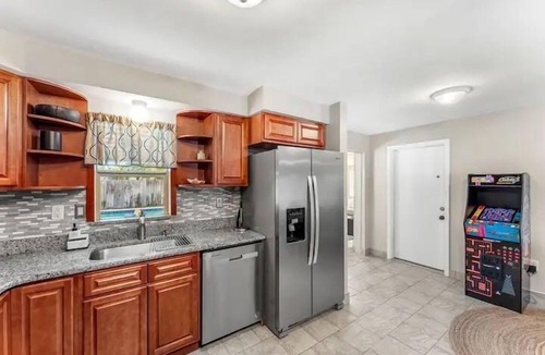 Cocoa Isles House | Private Pool + Hot Tub + Outdoor Movie Nights — Relax in your own backyard oasis with a heated pool, spa, fire pit, and fire up the projector under the stars. Located in famous Cocoa Beach near Kennedy Space Center, Disney & Port Canaveral!