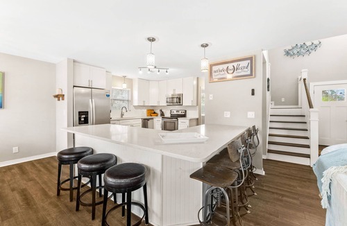 Gulfview Heights House | Private Pool, LSV/Golf Cart, Bikes, & 2 Kitchens! Easy Walk to Beach! Pet Friendly