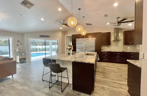 Willoughby Acres House | Quiet Luxury Coastal Naples Retreat Heated Pool + Designer Outdoor Living