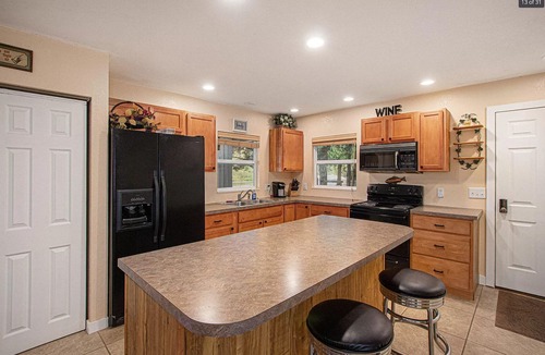 Mecosta Cottage | Quiet oasis steps from the water with access to Canadian Lakes amenities!