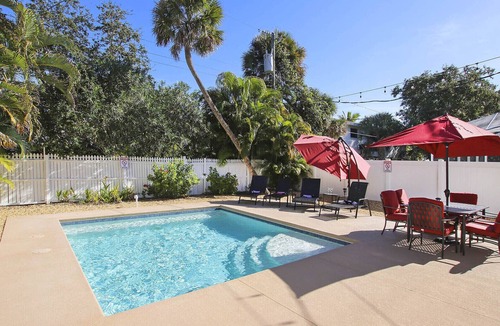 Mid Island House | Rare Find! Sea Breeze Gulf Home. Heated Pool, steps to the Beach.