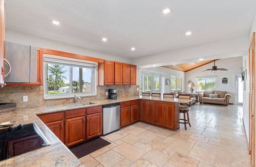 Twin Lakes House | Reel Paradise in Key Largo - 4 bed 3.5 bath, pool, outdoor kitchen, and dock.