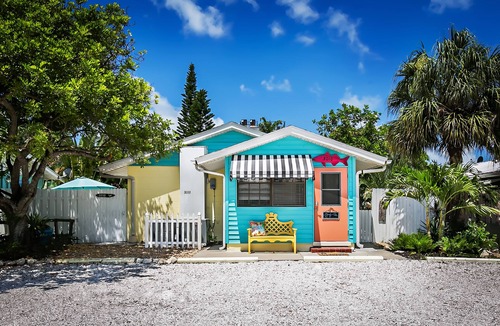 Ilexhurst Cottage | Relax and Tan on Your Private Patio. Just a minute to the beach