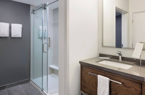 Hopelawn Hotel | Relax in Modern Room with 1 King Bed, Free Parking, Easy Highway Access