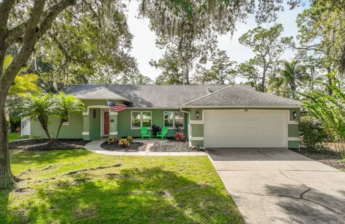 Palm Coast House | Relaxing 3bd Pool Home w/Lanai & Lush Backyard