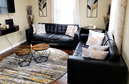 Dearborn House | Relaxing Modern Home accommodated for Families with privacy fence