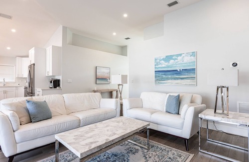 North Palm Beach Heights House | “Renovated 3BR Pool Home | Screened & Heated Pool | 3 King Beds”