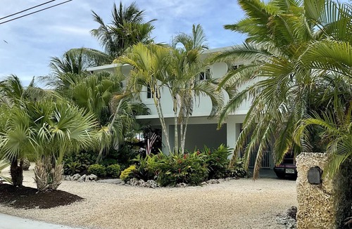 Tavernier House | Renovated Islamorada lush canal home with 2nd fl pool, ocean views and boat dock
