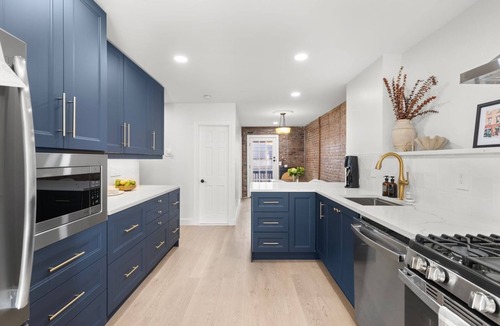 The Village House | Renovated townhome in Downtown Jersey City w Backyard patio