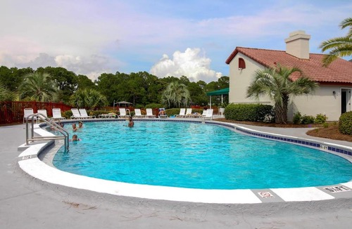Gulf Lagoon Beach Apartment | Resort condo near beach with private balcony WiFi pool tennis & dock