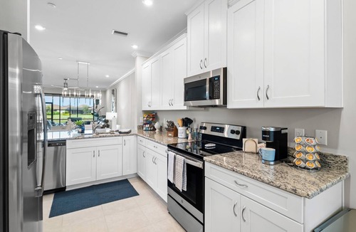 Naples Condo | Resort Living, Professionally Decorated, END Unit,1st Floor, Stunning Water View