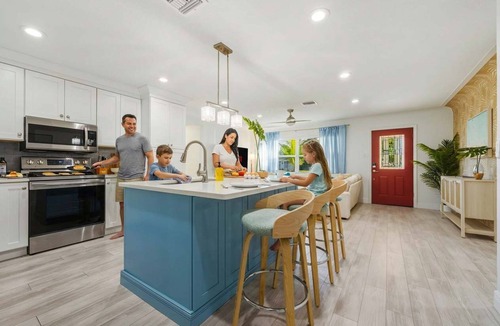 Seminole House | Resort Style Backyard Pool Hot Tub Movie Room
