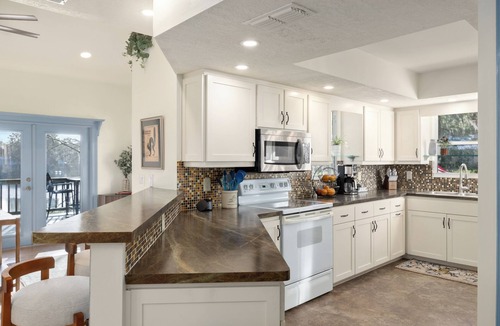 Dunnellon House | Riverfront 4-bedroom dog-friendly home on Blue Cove and the Rainbow River