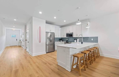 Jacksonville Beach Condo | Salty Pink Sands by Team Joseph Ellen