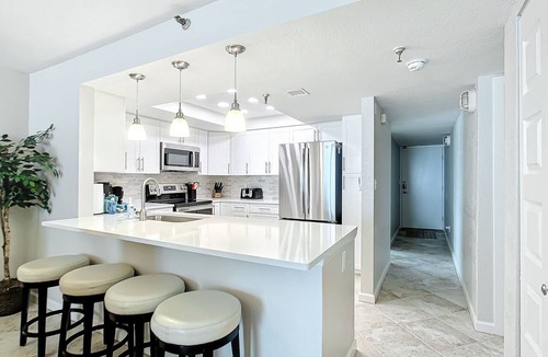 Indian Shores Condo | Sand Castle II # 2206 GULF FRONT Condo Spiral Staircase to Pool & Beach AMAZING
