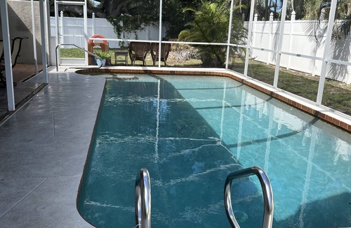 Pinecraft House | Sarasota's Family Friendly HEATED Pool Home Close to Siesta Key Beach