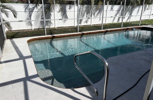 Pinecraft House | Sarasota's Family Friendly HEATED Pool Home Close to Siesta Key Beach