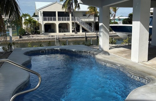 Summerland Key House | Sea Glass House of Summerland Key! Pool, 70 feet of Seawall, deep water canal!