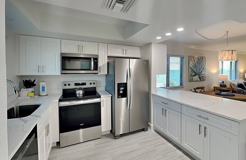 Mid Island Condo | Seaside 401 | Newly Renovated Corner Condo w. Stunning Gulf Views!