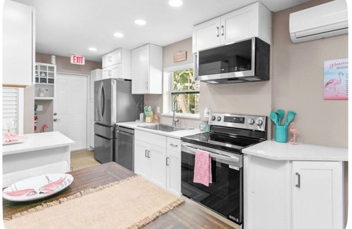 Cocoa Beach Villa | Seaside Flamingo Retreat in Downtown Cocoa Beach.Walk to Beach, Shops & Dining