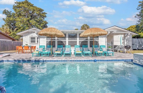 Dolphin's Cove House | Seaside Paradise: Dive into Luxury with Saltwater Pool, Spa, and Chemical-Free Bliss