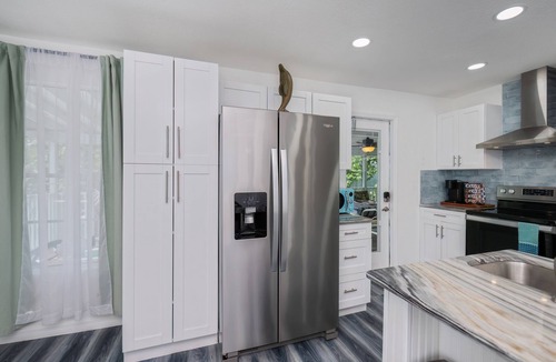 Placida Cottage | Secluded Beach House, steps to Sandy Beach on LGI with a shared dock!🏖️🎣