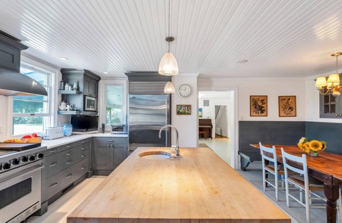 North Sea House | Secluded, Charming Southampton Farmhouse with pool, gardens, and timeless.
