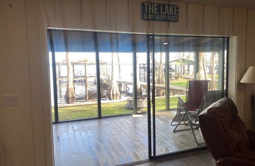 Clermont House | Secluded lake front w/private dock, boat lift, large screened porch