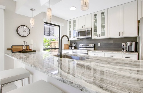 Hunt Club Condo | Serene Water-View Retreat with Wraparound Lanai & Elegant Renovations