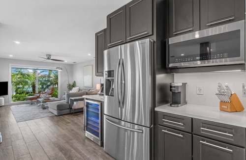 Singer Island Villa | Seven Palms Waterfront - Private Dock, Heated Pool & Lanai - Walk to Beach!