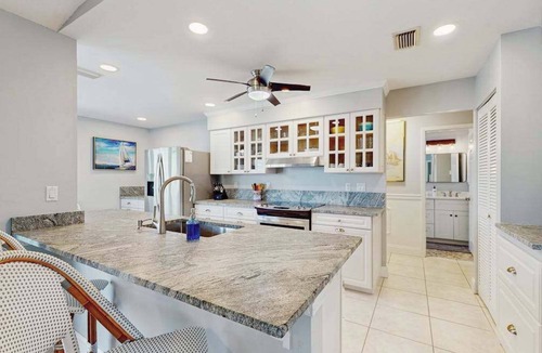 Englewood East House | Snowbird-friendly home with private pool, water views, patio & sunroom