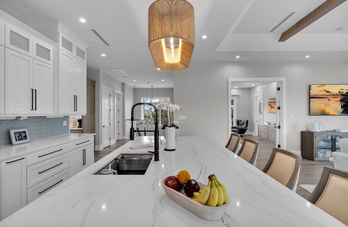 Coury House | Sophisticated 5-bedroom, elevator, 50' dock, heated pool/spa, kayaks, sleep 12