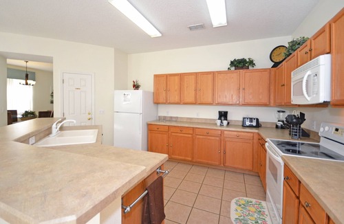 Windwood Bay House | South Facing Pool Home With Large Secluded Deck