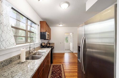 Ocala House | Southern Porch Life Circa 1938 > with 4 bed 2 bath plus 1 screen porch with Fan