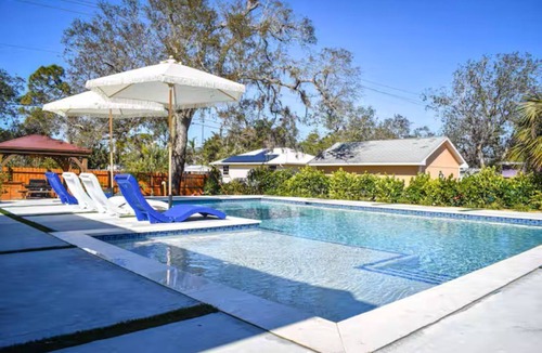 Bonita Shores House | Spacious 4 Bedroom Home in Bonita Springs Heated Pool 5 Minutes from Beach