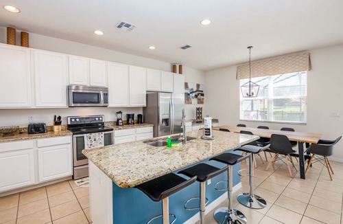 Kissimmee House | Spacious 4BR townhome in Kissimmee with lake views, perfect for families!