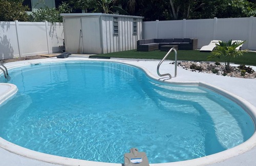 Chandler Park House | Spacious 5-bedroom pool house in Cape Canaveral with air hockey WiFi, AC